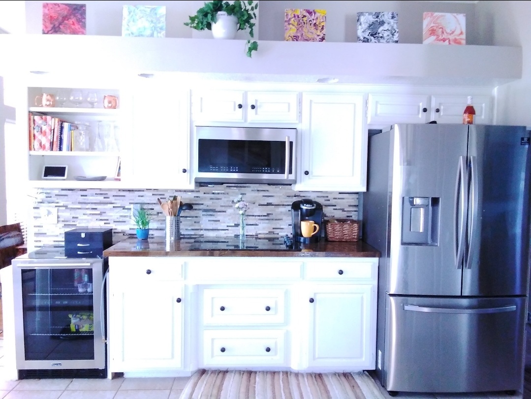 Bright white kitchen, every surface dust-free